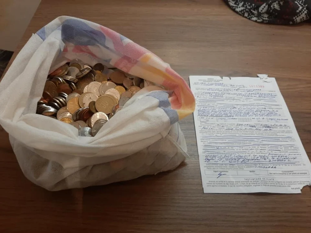 Ştefan Cojocnean a plătit amenda de 250 de lei cu monede