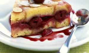 Cherry brioche style cake topped with thinly sliced almonds jpeg