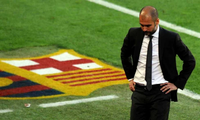 Barcelona - Real. Guardiola era îngândurat la pauză * Foto: Reuters