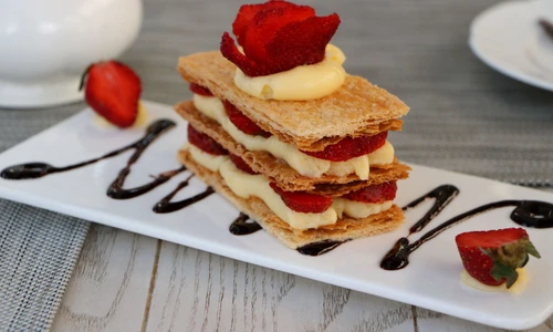 51347563   strawberries mille feuille cake in white plate jpeg