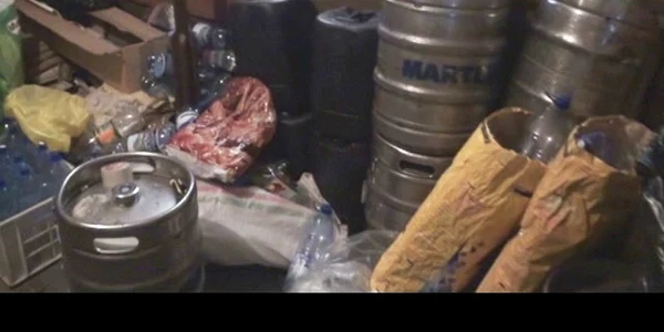 Fabrică ilegală de băuturi alcoolice