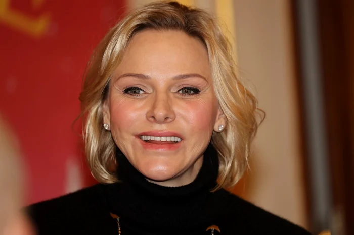 Fotografii au surprins cu greu un zâmbet pe chipul prințesei la evenimentul de Crăciun de la palat