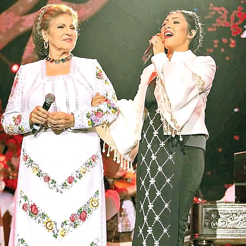 Alături de Irina Loghin a interpretat piesa „Mi-ai dat mamă cântecul”