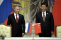 Vladimir Putin Xi Jingping  FOTO. Reuters