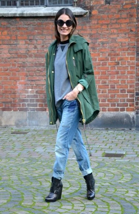 With gray sweatshirt black boots and green parka jpg jpeg