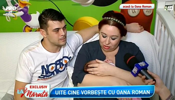 
    Oana Roman, în braţe cu fetiţa ei, Maria Isabela. (captură Pro TV)  