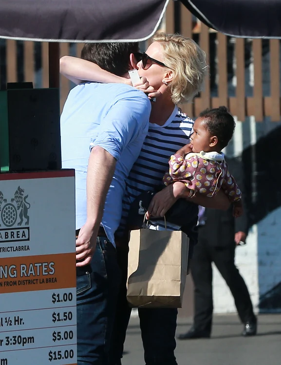 Exclusive    Charlize Theron Out For Lunch With A Mystery Man jpeg