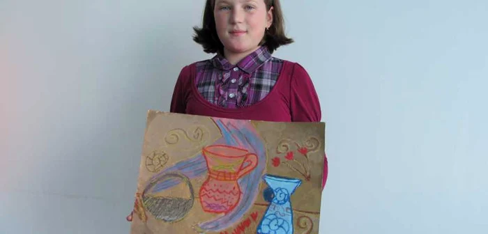 Cosmina este mândră de creaţiile sale