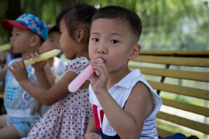 
    Nord Coreenii s-au bucurat de o zi liberă în parcul de distracții după 200 de zile de muncăFoto AFP  