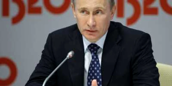 Vladimir Putin a obţinut duminică seară 64,39% din voturi după numărarea buletinelor din 50 la sută din secţiile de vot.