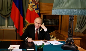 Vladimir Putin vorbește la telefon FOTO Profimedia