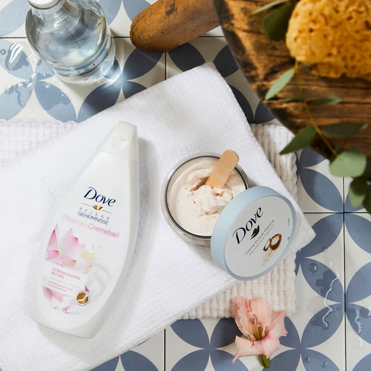 Scrub de corp cu macadamia și orez pentru exfoliere de la Dove Foto eMAG