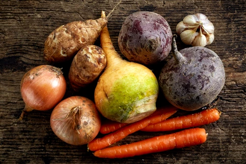 36313312 various fresh raw vegetables on wooden table, top view jpeg