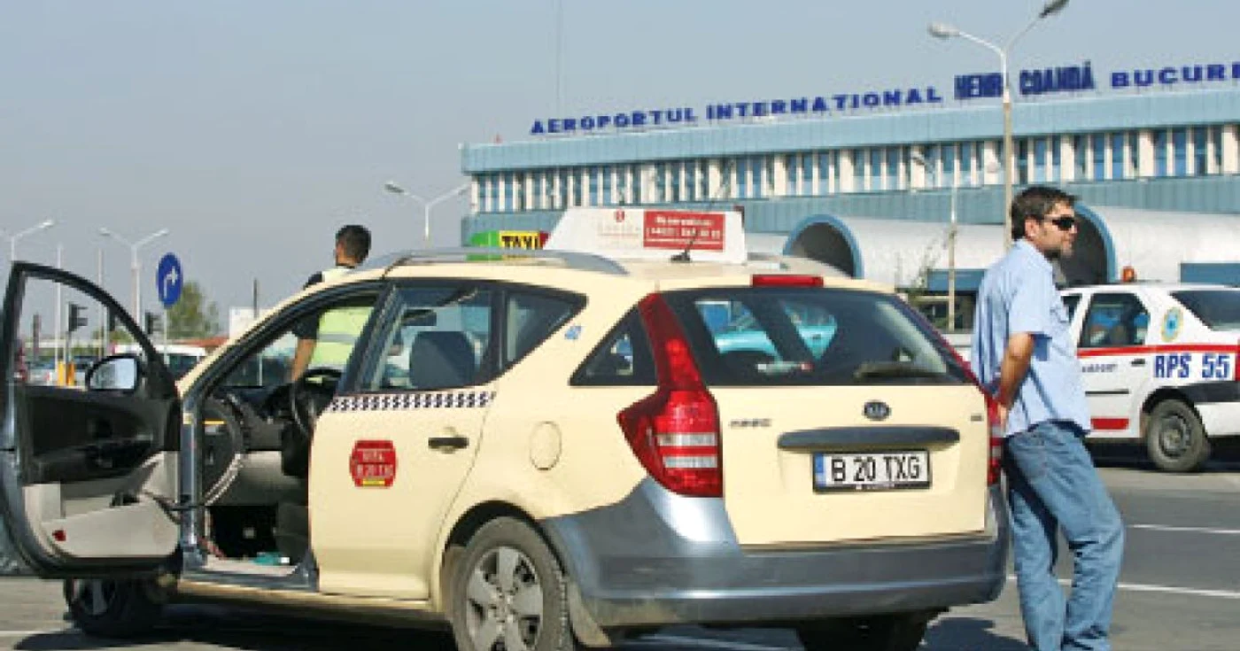 Taxi în fața Aeroportului Otopeno