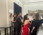 Aseară, ea a fost vedeta colecției designerului Denis Predescu și a îmbrăcat o rochie superbă, lungă, de culoare roșie