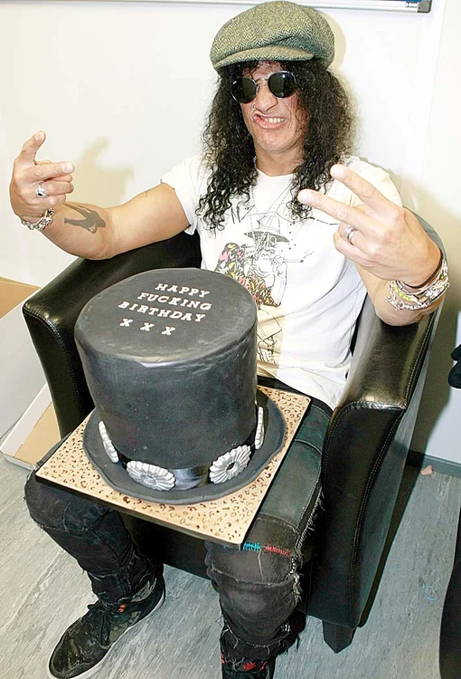 2011 Slash  (49 de ani) 