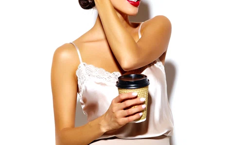 portrait beautiful happy cute sexy brunette woman with red lips wide classic pants holding plastic coffee cup white background jpg