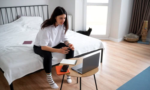 woman talking using her laptop home quarantine jpg