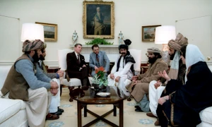 Reagan sitting with people from the Afghanistan Pakistan region in February 1983 jpg