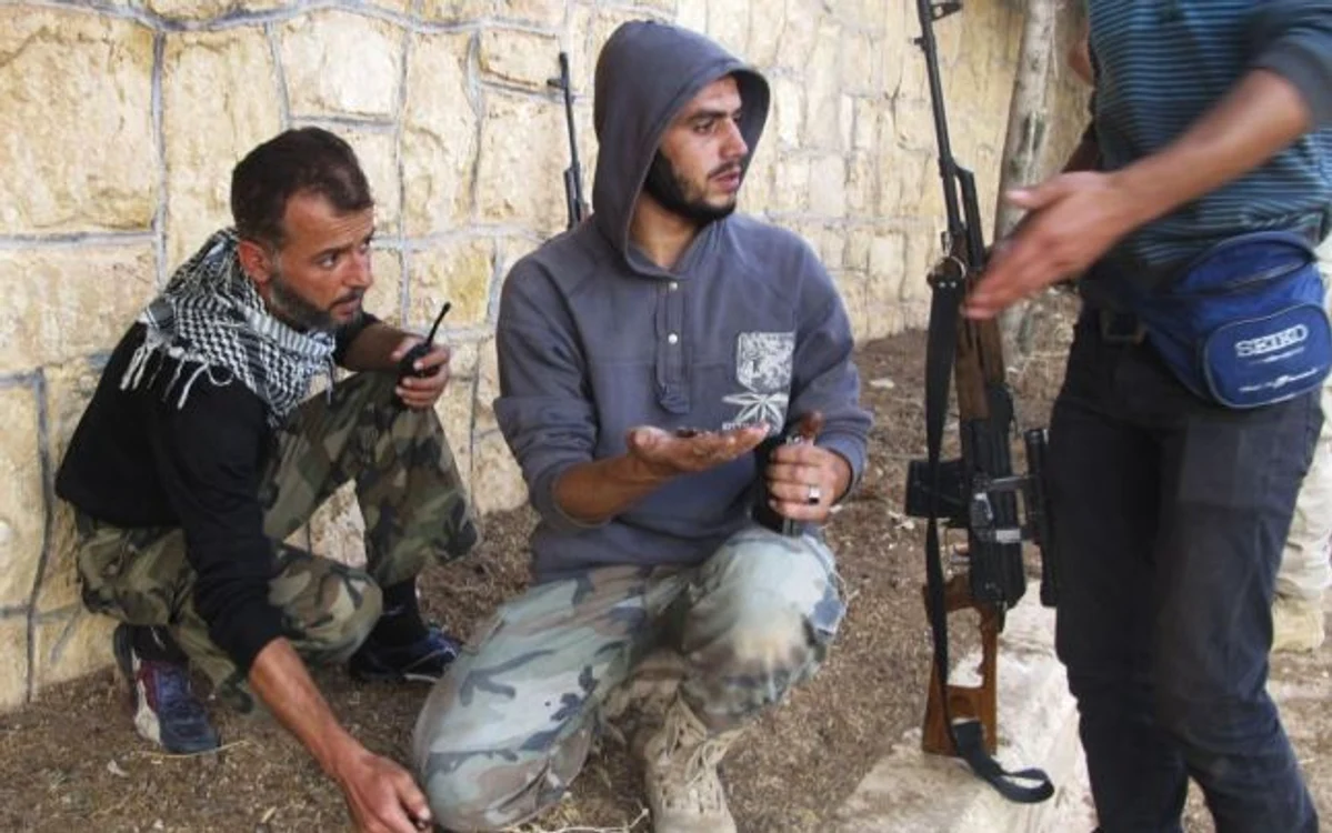 
    Rebeli înarmaţi în Siria FOTO AFP  