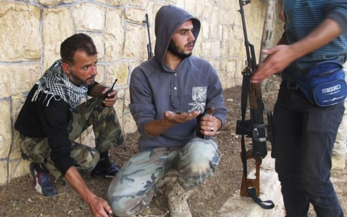 
    Rebeli înarmaţi în Siria FOTO AFP  