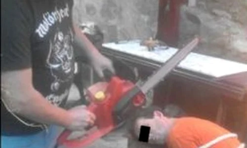 Simularea unei decapitări în stil ISIS jpeg