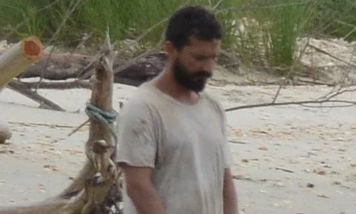 *EXCLUSIVE* Shia LaBeouf exposes himself using the ocean as his toilet on set with Dakota Johnson and Zack Gottsagen jpeg