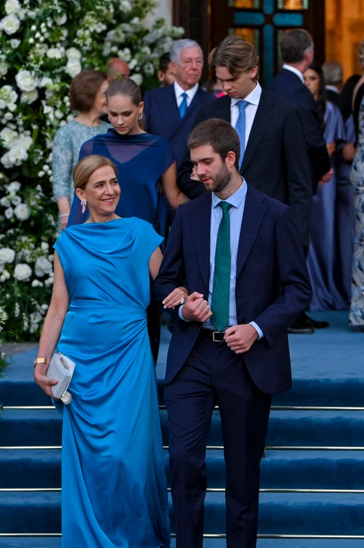  Infanta Cristina și Juan Urdangarin și, în spatele lor, Irene Urdangarin și Miguel Urdangarin. FOTO: Getty Images
