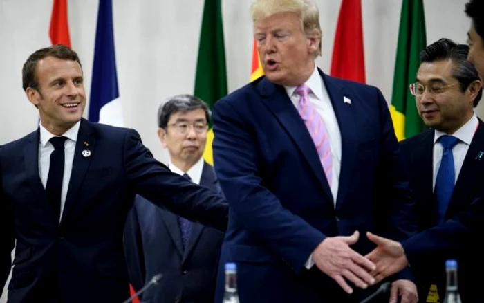  Macron și Trump, la un Summit G20, în urmă cu câțiva ani. FOTO arhivă AFP