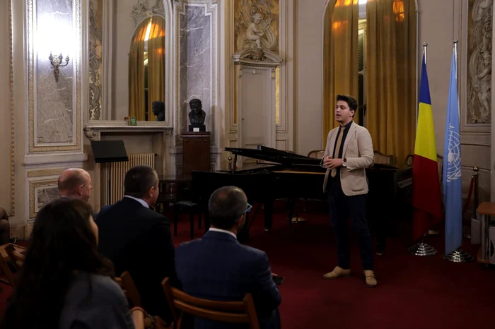 Aurelian Mohan adresându-se tuturor reprezentanților ONU din România (2018). FOTO: Arhivă personală