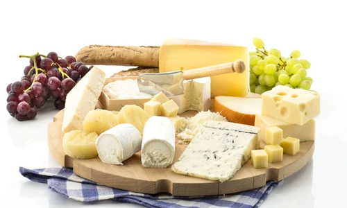 Cheese platter with different cheese and grapes jpeg