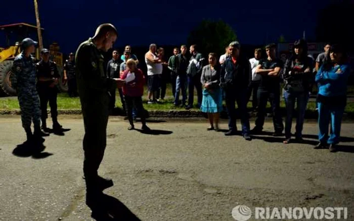 Zeci de victime, în urma prăbuşirii cazarmei din Omsk FOTO RIA Novosti