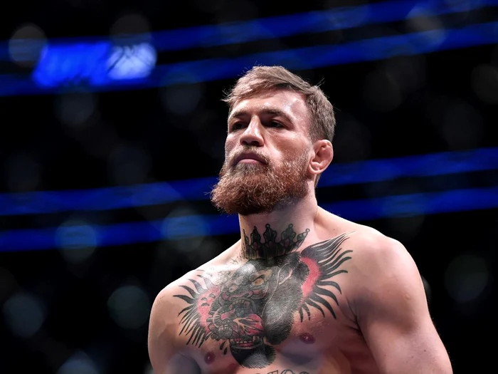 
    Conor McGregor şi Floyd Mayweather s-au privit sfidător înaintea meciului disputat în august, 2017 Foto:GettyImages   