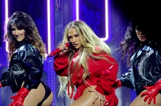Jennifer Lopez shakes her derriere and swings a stickball stick at a Tidal Concert at Barclays in Brooklyn jpeg