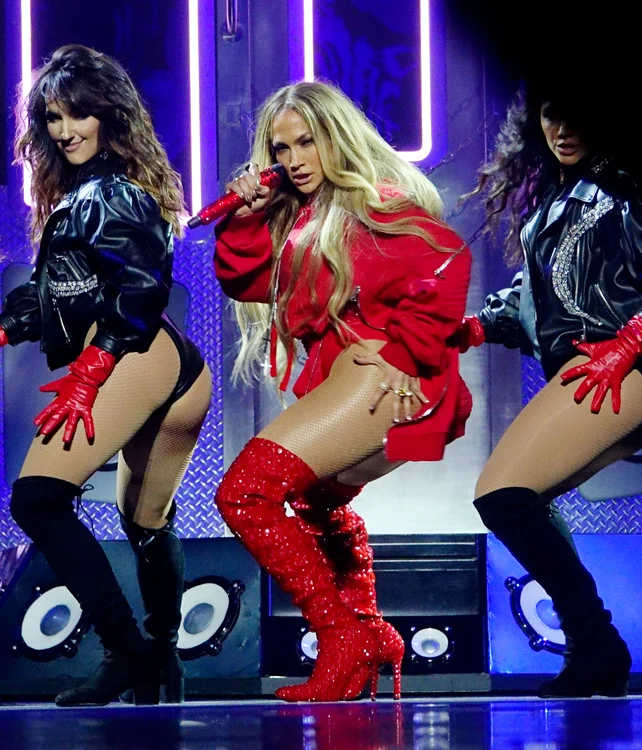 Jennifer Lopez shakes her derriere and swings a stickball stick at a Tidal Concert at Barclays in Brooklyn jpeg