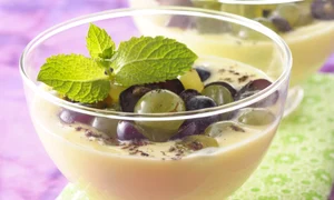 Almond cream dessert with black and white grapes jpeg