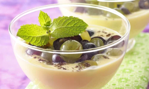 Almond cream dessert with black and white grapes jpeg