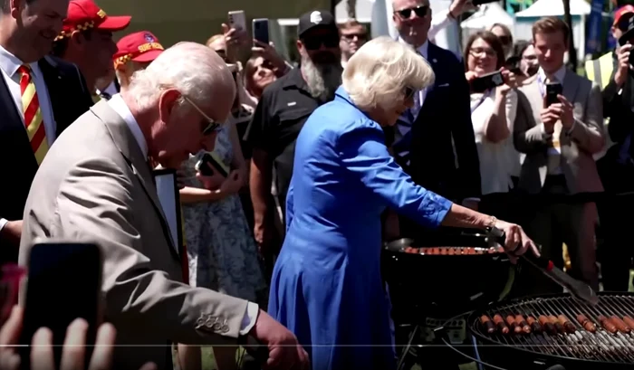 Regele Charles regina Camilla, la un barbecue uriaş. FOTO captură ABS-CBN News 