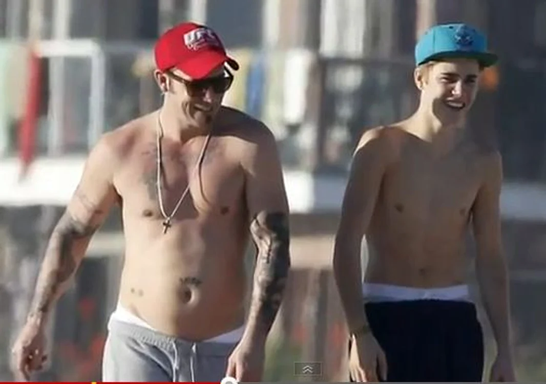 
    Justin Bieber și tatăl său  