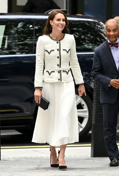 Kate Middleton, foarte elegantă la apariția în Londra