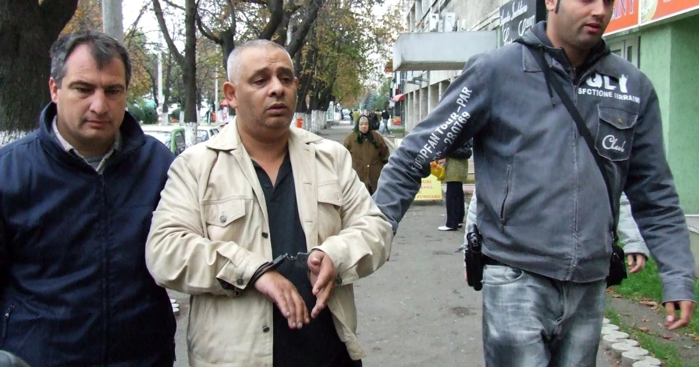 Costel Feraru, în momentul în care a fost dus la Parchet