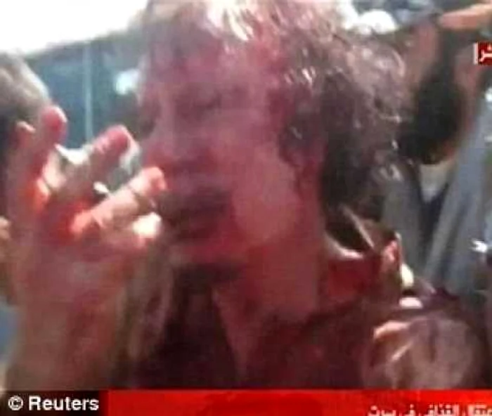 Gaddafi şi-a implorat călăii să-l cruţe