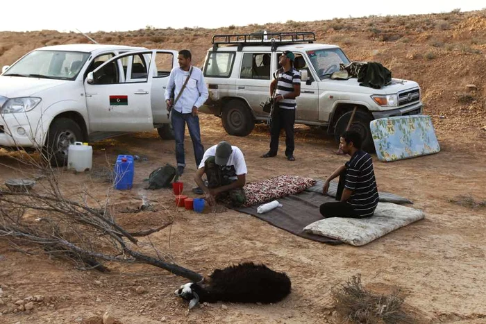 Luptele dintre rebeli şi forţele lui Gaddafi continuă în Libia