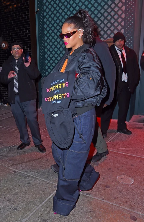Rihanna covers her ring finger while enjoying a night out at Avenue with Dascha Polanco jpeg