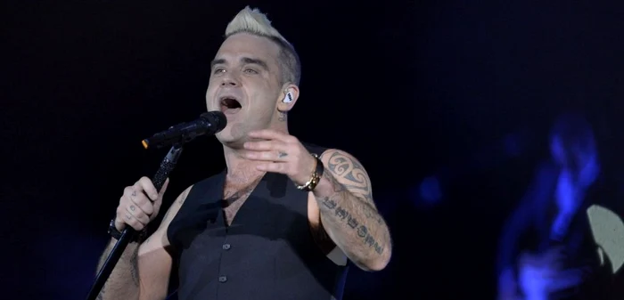 Robbie Williams a
fost uimit de reacţia fanilor români FOTO Mediafax