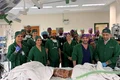 The surgical team poses with Mercy and Goodness Gemini Untwined jpg