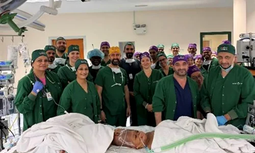 The surgical team poses with Mercy and Goodness Gemini Untwined jpg