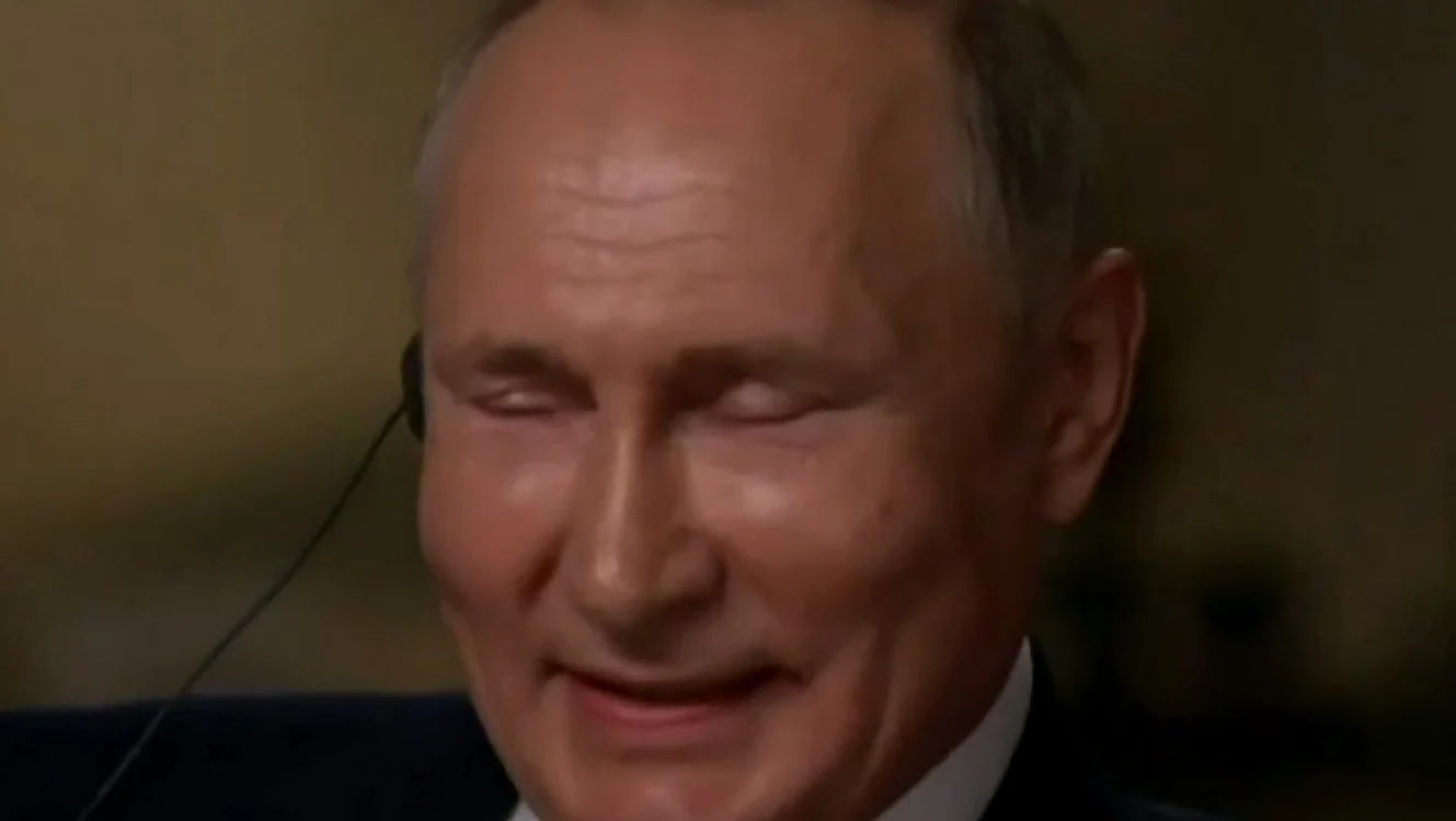 Râsul lui Putin când este întrebat dacă se consideră un criminal. FOTO Captură Digi24