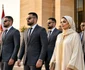 Prințesa Ameera al Taweel însoțită de bodyguarzi.