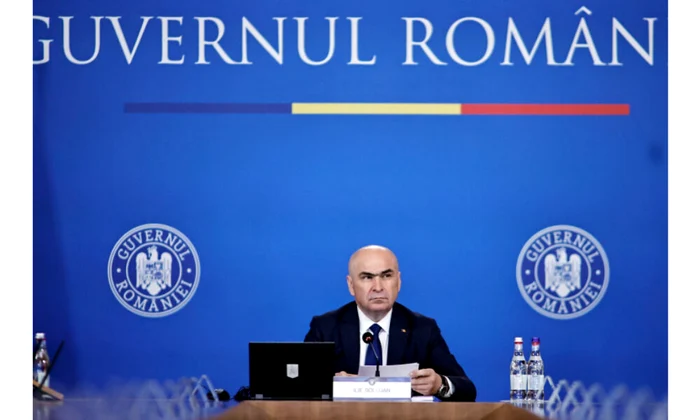 Premierul Ilie Bolojan, în timpul unei ședințe de guvern. FOTO: Guvern